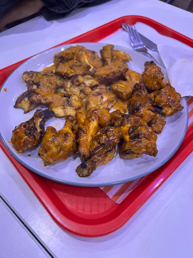 Wings glazed to perfection - before SnackSnap AI enhancement