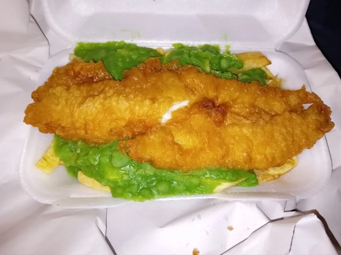 Battered fish with perfect golden crunch - before SnackSnap AI enhancement