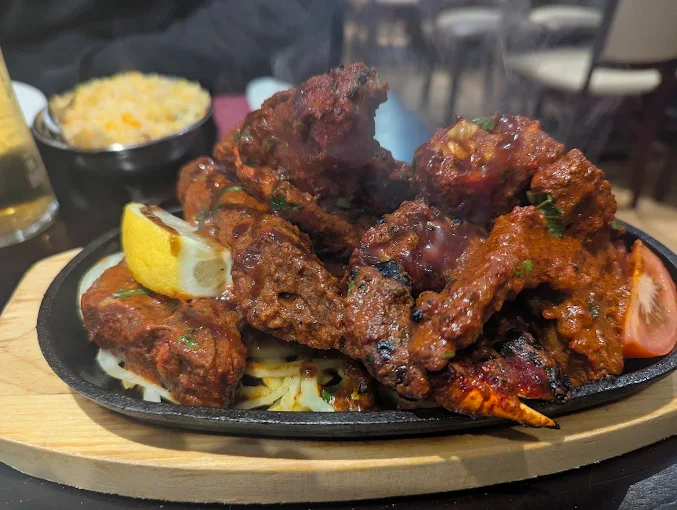 Tandoori dishes with perfect char - before SnackSnap AI enhancement