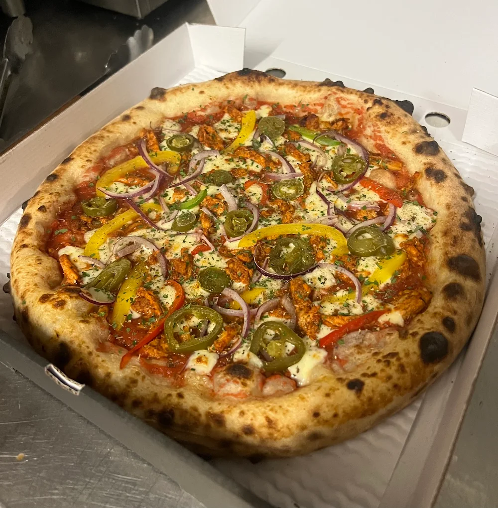 Loaded pizzas shot from every angle - before SnackSnap AI enhancement